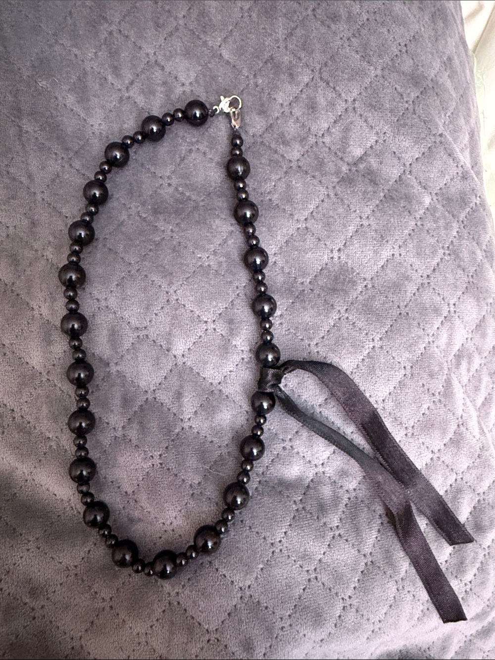Classic Black Beaded Necklace with Ribbon Accent